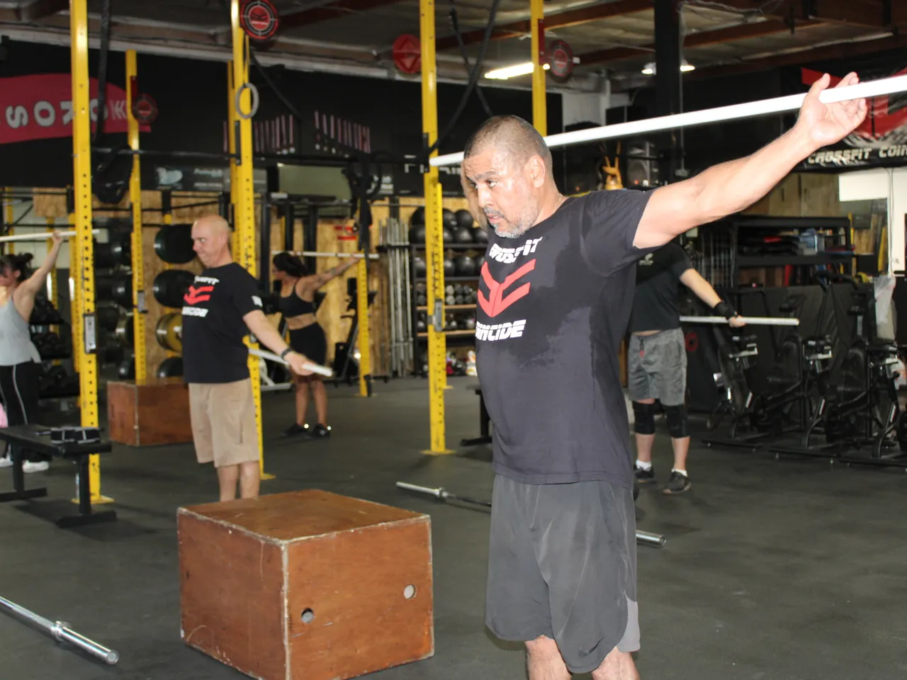 A class warming up with PVC pipes