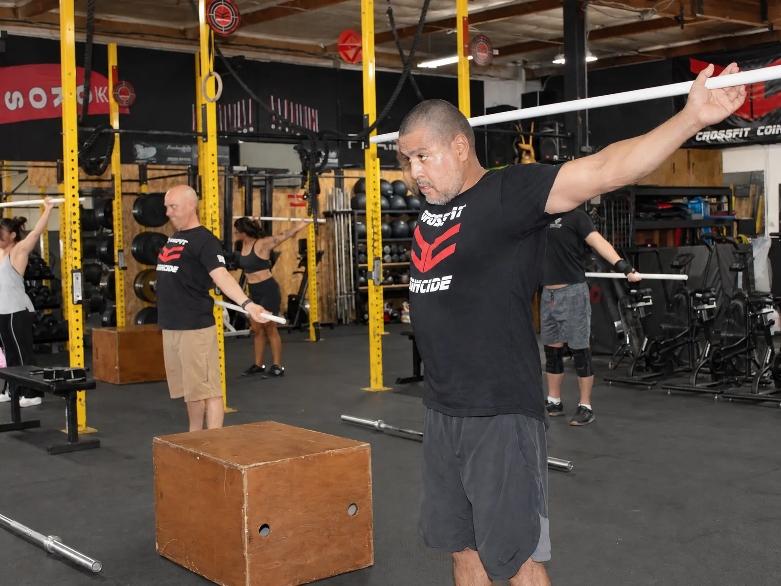 A class warming up with PVC pipes